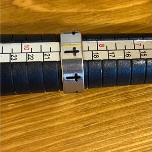 Cross cut out band ring in silver tone stainless steel size 8 3/4